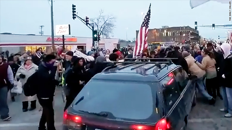 [Image: 170815172643-protesters-blocking-road-780x439.jpg]