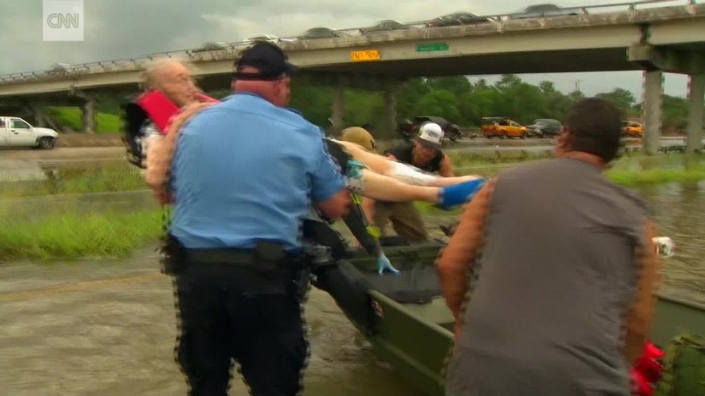 See dramatic rescues as Harvey flooding spreads