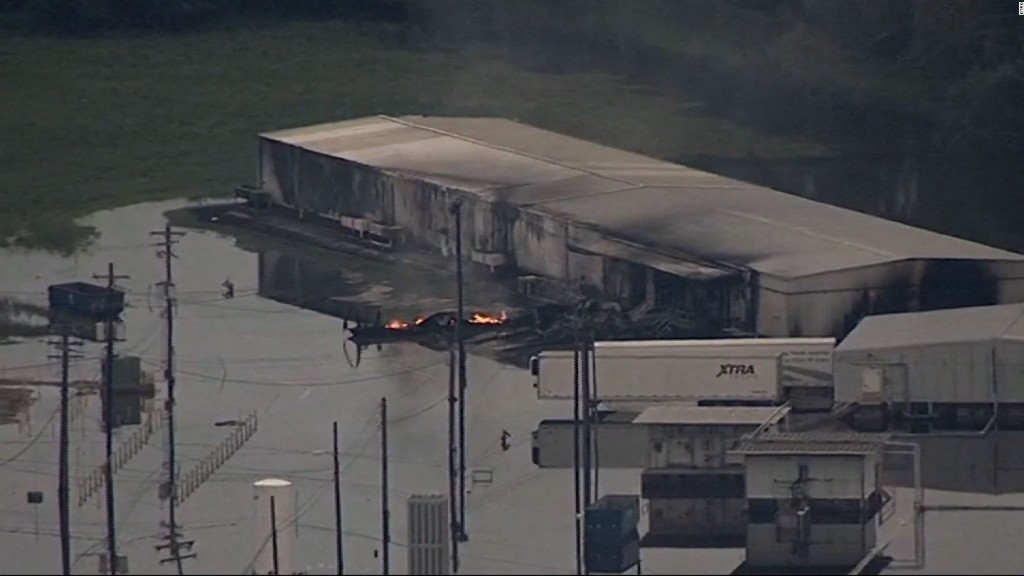 Fire at flooded chemical plant