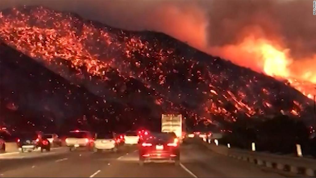 Video shows fire raging near freeway