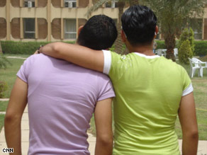 Rami and Kamal, both gay Iraqis, say they rarely show affection for men in public.