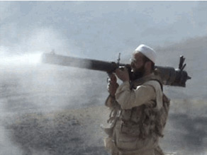 A photo purporting to show Moez Garsallaoui firing a rocket launcher on the Afghanistan-Pakistan border.