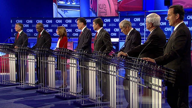 Perry comes under fire at the CNN/Tea Party debate - CNN.com