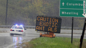 A sign warns drivers Wednesday in Zanesville, Ohio. Gov. John Kasich says he wants to tighten laws for exotic animals.