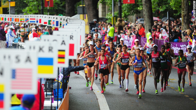Runners make their way through London during the women's marathon.