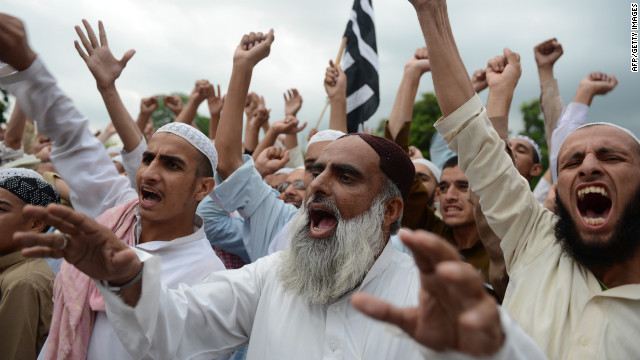 Pakistani activists shout slogans in Islamabad on Sunday, September 16.