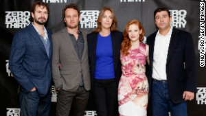 Screenwriter Mark Boal, left, and director Kathryn Bigelow, center, pose with cast members of \" border=