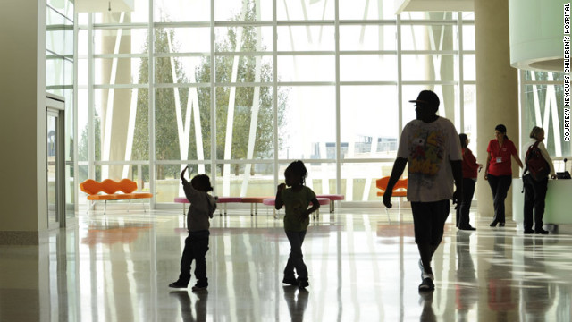 Families walk through the lobby of Nemours Children's Hospital in Orlando, Florida, on opening day in October. 