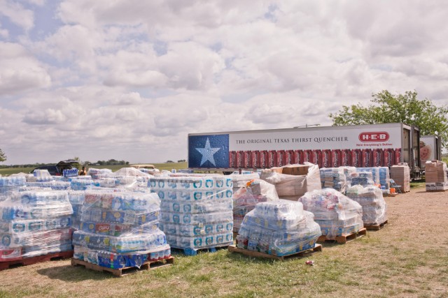 Donations of water stack up at the site of Westfest, a fall celebration of Czech heritage.