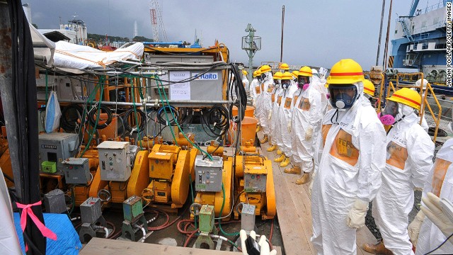 Local government officials and nuclear experts inspect the Fukushima Daiichi nuclear plant earlier this month.