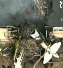 Plane slams into home, pilot then ... - CNN.com Video