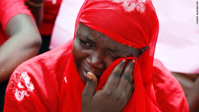 A woman attends a demonstration Tuesday, May 6, that called for the Nigerian government to rescue more than 200 schoolgirls who were kidnapped last month in Chibok, Nigeria. The girls were taken by the Islamist militant group Boko Haram, which means "Western education is sin."