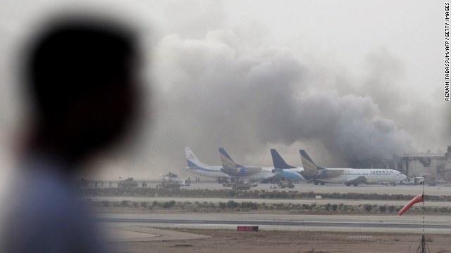Smoke rises from Jinnah International Airport in Karachi, Pakistan, on Monday, June 9, after militants launched an attack in the cargo area. The Pakistani Taliban claimed responsibility for the five-hour-long assault that killed at least 28 people and injured more than 20 others.