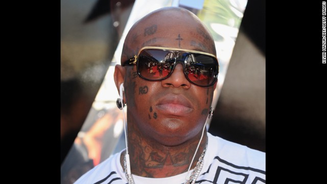 Rapper Birdman has tattoos on his face, arms and legs including ...