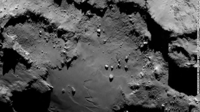 The European Space Agency's Rosetta spacecraft has become the first probe to orbit a comet after arriving at its destination Wednesday, August 6. This is the latest image sent from the spacecraft, at a distance of 130 km, during its final approach to comet 67P/Churyumov-Gerasimenko. It reveals close up detail of the smooth region on the "base" of the "body" section of 67P. 