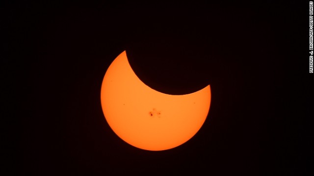 Moon clipped sun like a fingernail during eclipse - CNN.com