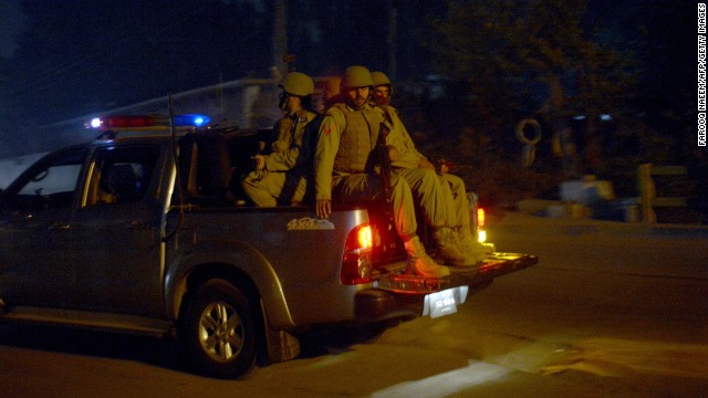 Soldiers patrol the streets in Peshawar, Pakistan, near a school that was attacked by the Pakistani Taliban on Tuesday, December 16. Militants stormed the military-run school in northwest Pakistan, killing more than 140 people, most of them children. More than 100 people were injured.