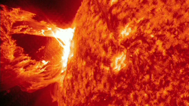 Sun spits out giant fireball - CNN Video