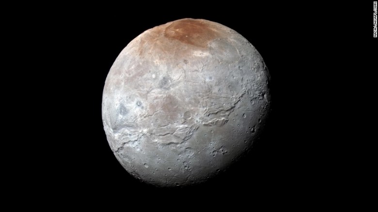 &lt;a href=&quot;https://www.nasa.gov/feature/pluto-s-big-moon-charon-reveals-a-colorful-and-violent-history&quot; target=&quot;_blank&quot;&gt;Pluto&#39;s largest moon, Charon&lt;/a&gt;, in seen in enhanced color in this image taken by NASA&#39;s New Horizons spacecraft. The space probe took the image just before it made its closest approach on July 14, 2015. The image combines blue, red and infrared images to best highlight the moon&#39;s surface features. Charon is 754 miles (1,214 kilometers) across. The image was released on October 1, 2015. 