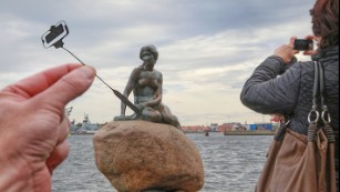 Copenhagen's Little Mermaid is apparently no selfie-stick snob.