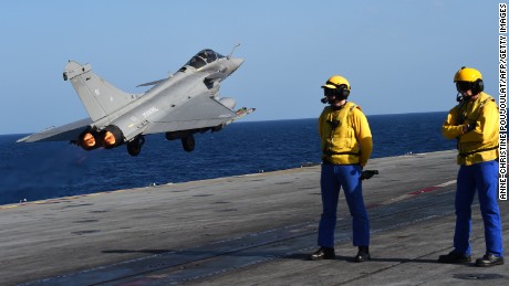 A French fighter jet takes off from the carrier Charles de Gaulle on Monday.