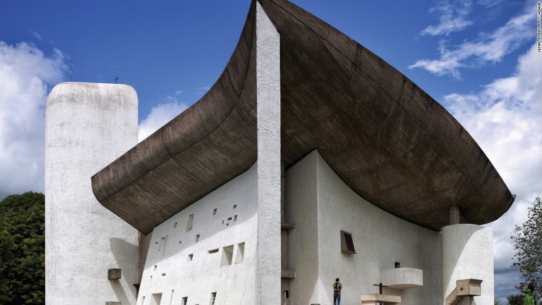 Chapelle Notre Dame du Haut, Ronchamp, 1954 -- The chapel was built on a pre-existing pilgrimage site. Curved roof and surface floor following the slope demonstrate Le Corbusier&#39;s mastery of concrete. 