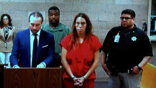 Michelle Martens was charged in court Thursday with kidnapping and child abuse resulting in death 