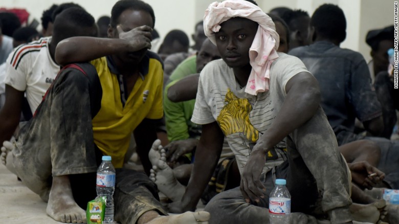 Survivors from the boat sit in a police station in Rashid on September 21.