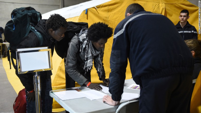 Migrants on Monday registered to claim asylum in France and be settled in different regions.