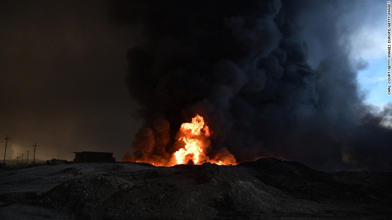  An oil field that was set alight by retreating ISIS fighters in Qayyara, near Mosul.