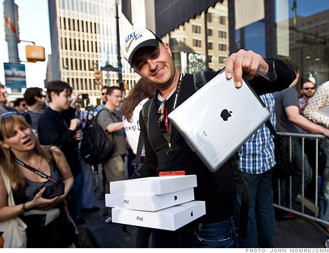 Apple's thinner and faster iPad 2 drew giant crowds on its launch day.