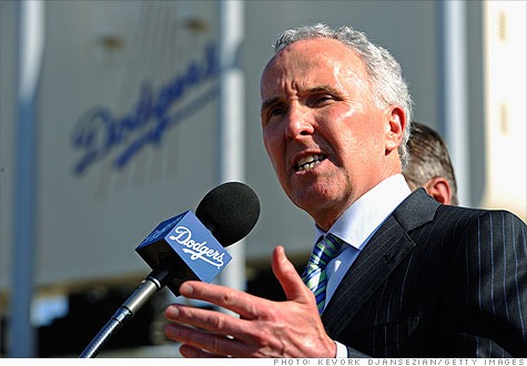 Frank McCourt's fight with Major League Baseball for control of his team has more to do with his debt than his divorce.