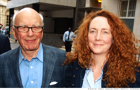 Former News of the World editor Rebekah Brooks is arrested in connection with British police investigations into phone hacking and police bribery.