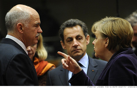 German Chancellor Angela Merkel (R) and French President Nicolas Sarkozy (C) talk with Greek Prime Minister George  Papandreou at an EU summit in February.