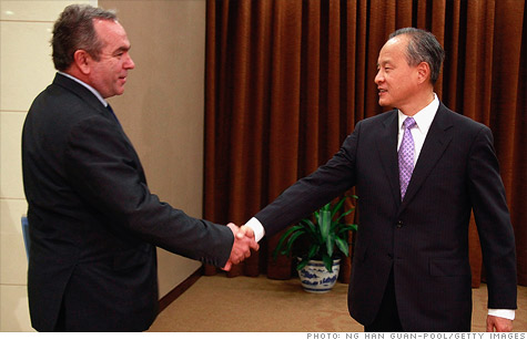 U.S. Assistant Secretary of State Kurt Campbell (left) meets China's Vice Foreign Minister Cui Tiankai for talks in Beijing on October 11, 2011.