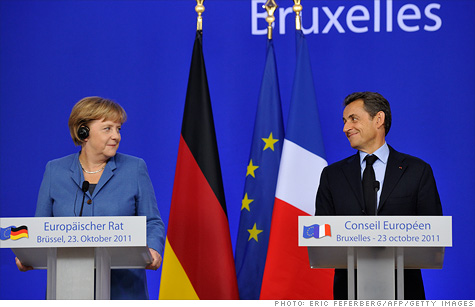 German Chancellor Angela Merkel and French President Nicolas Sarkozy hold a joint press conference about progress made to solve the eurozone debt crisis.