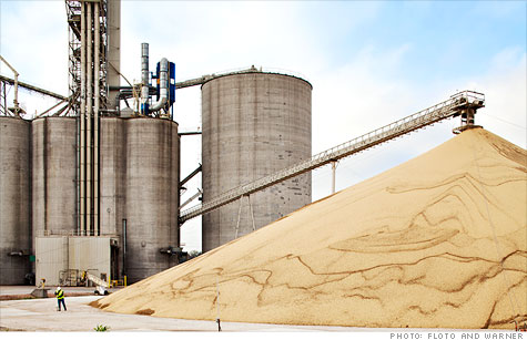 Just-harvested soybeans are stacked high at a Cargill grain elevator in Albion, Neb.