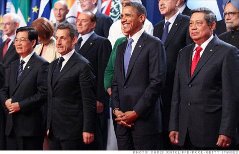 World's top economic leaders stand together for a 'family portrait' at the G20 summit in Cannes.