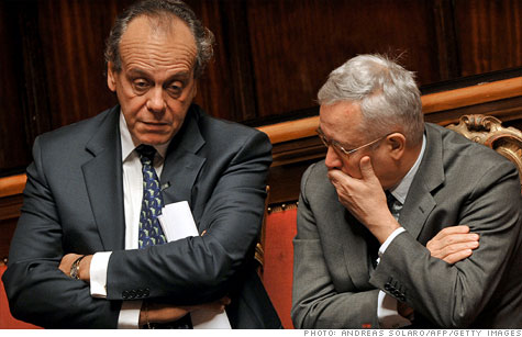 Nitto Palma and Giulio Tremonti  talk as Mario Monti, the frontrunner to replace Silvio Berlusconi as Italian prime minister arrives at the Senate in Rome on November 11.