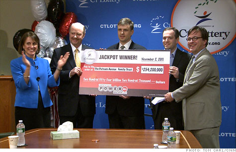 Co-workers Tim Davidson, Brandon Lacoff and Greg Skidmore claimed the November 2 prize, that netted them $103.5 million at a presentation by the Connecticut Lottery Corporation.