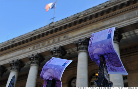 French bond auctions drew solid demand but nervous investors were too focused on downgrades to notice.