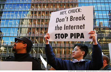 A SOPA protestor standing outside the Manhattan office of Sen. Charles Schumer, D-N.Y., on Jan. 20.