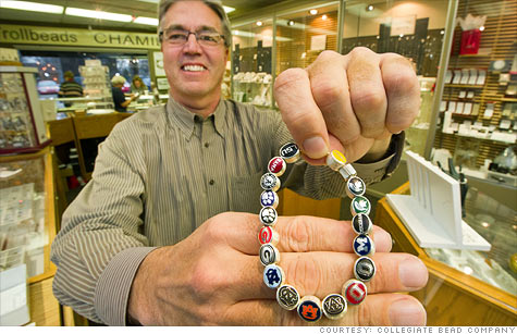 Dave Schowalter, owner of  Collegiate Bead Company, shows off his colorful sterling silver beads.