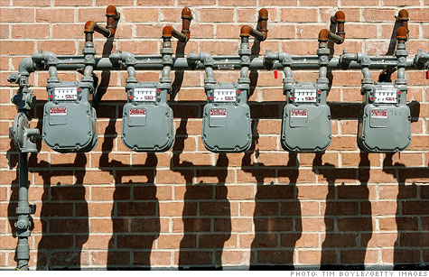 Natural gas meters outisde a residential building in Illinois. Analysts see prices dropping below $2 as slack demand and rising output lead to a supply glut.