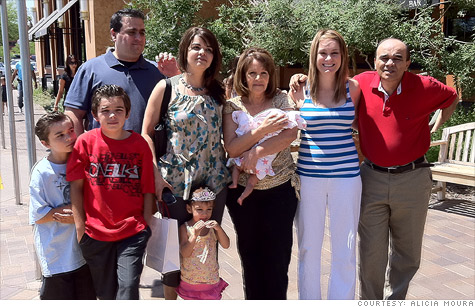 The Moura family has found that living together helps ease the pain of the recession.