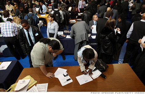 Americans filing for unemployment benefits falls by 1,000, as closely watched reading shows modest improvement.