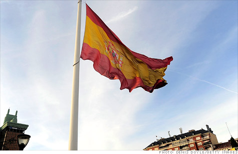 The rating agency also downgraded four Spanish regions, two of them to junk.