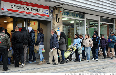 People wait on line at a government unemployment office in a Madrid suburb. Spain had the highest unemployment rate in Europe in April.
