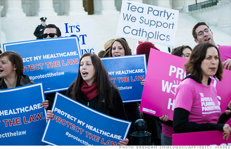 Supporters and opponents of the health reform law rallied in front of the Supreme Court in March.