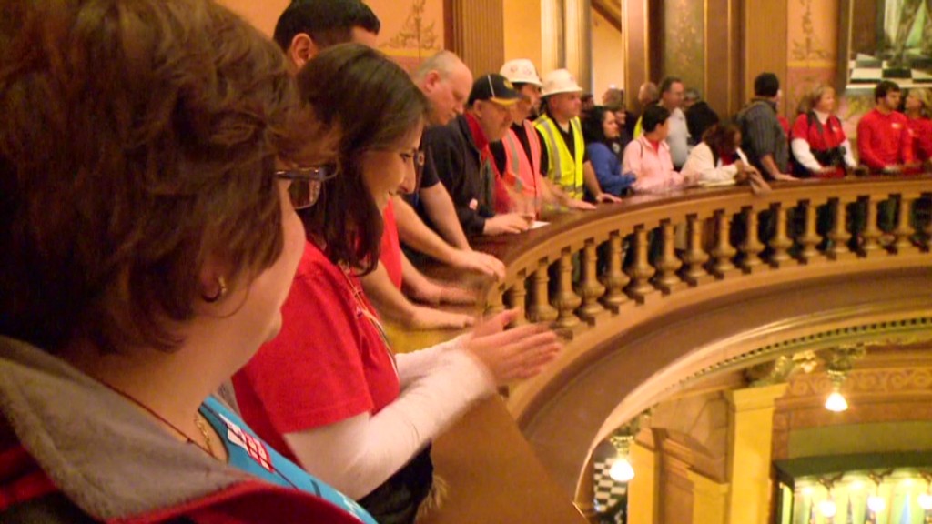 Protesting workers swarm Michigan capitol